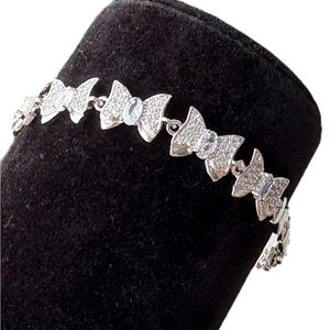 Silver Bow Cubic Zirconia Bracelet with Clasp Closure